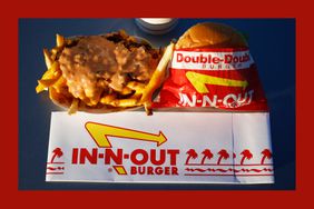 A Double-Double Cheeseburger Combo with Animal Style French Fries is arranged for a photograph at an In-N-Out Burger restaurant.