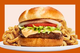 A Quarter Pound Burger and Fries from Hooters on an orange framed background. 