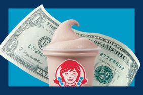 A Wendy's Frosty in front of a one dollar bill. 